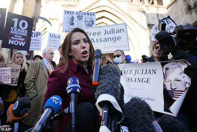 Stella Moris, partner of Julian Assange, speaks to journalists in front of the High Court after the ruling