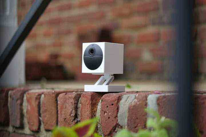 Wyze Cam Outdoor outside resting on bricks.