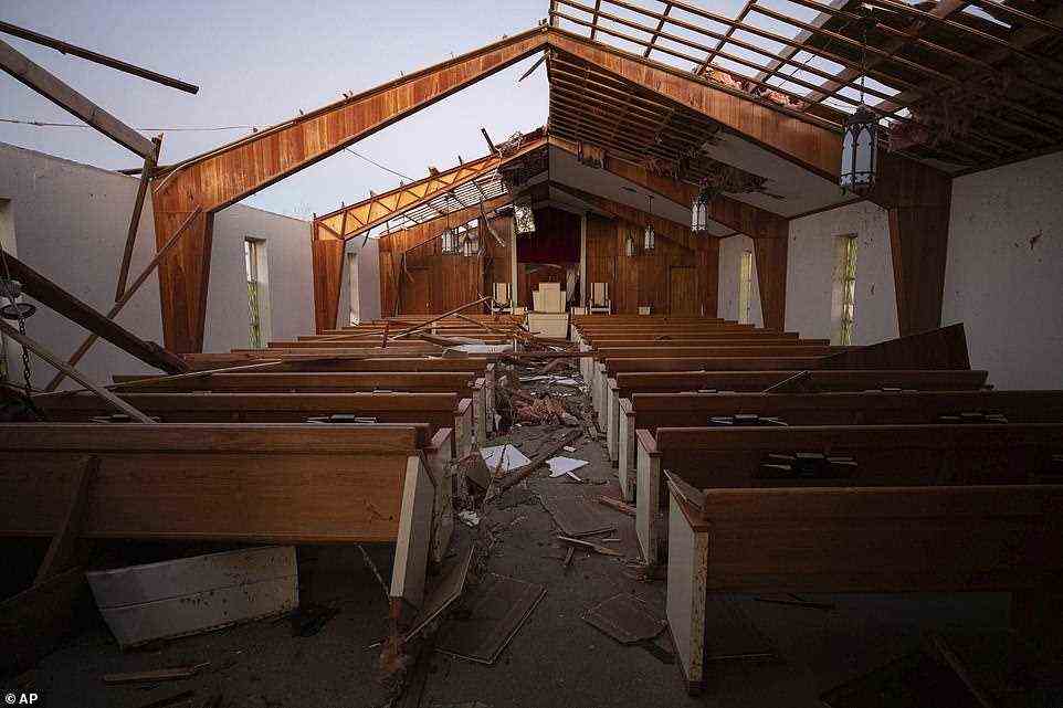 The remains of Dawson Springs Primitive Baptist Church after a tornado in Dawson Springs on Sunday. A monstrous tornado, carving a track that could rival the longest on record, ripped across the middle of the U.S. on Friday