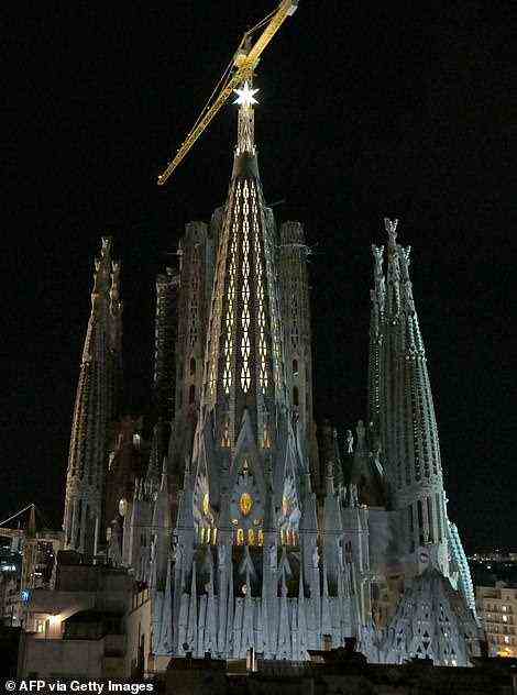 Pictured is the much-anticipated 'lighting of the star' ceremony, illuminating the new tower. Pope Francis sends a video message to mark the occasion, hailing the ‘great architect’ Gaudi