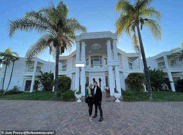 Pictured outside their home, the couple have created a successful business out of the luxury lifestyle blog they created after the birth of their son