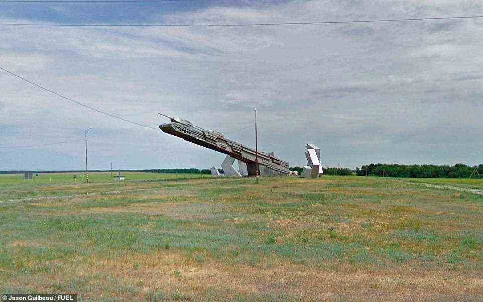 Shot in Volgograd Oblast in Russia, this image showcases a massive tank monument. The foreword to the book reveals: 'Using limited materials and a prescribed vocabulary of symbols, the anonymous creators of these works strived for originality. Although their work is propaganda, the imaginativeness and dynamism they exhibit echoes down the decades'