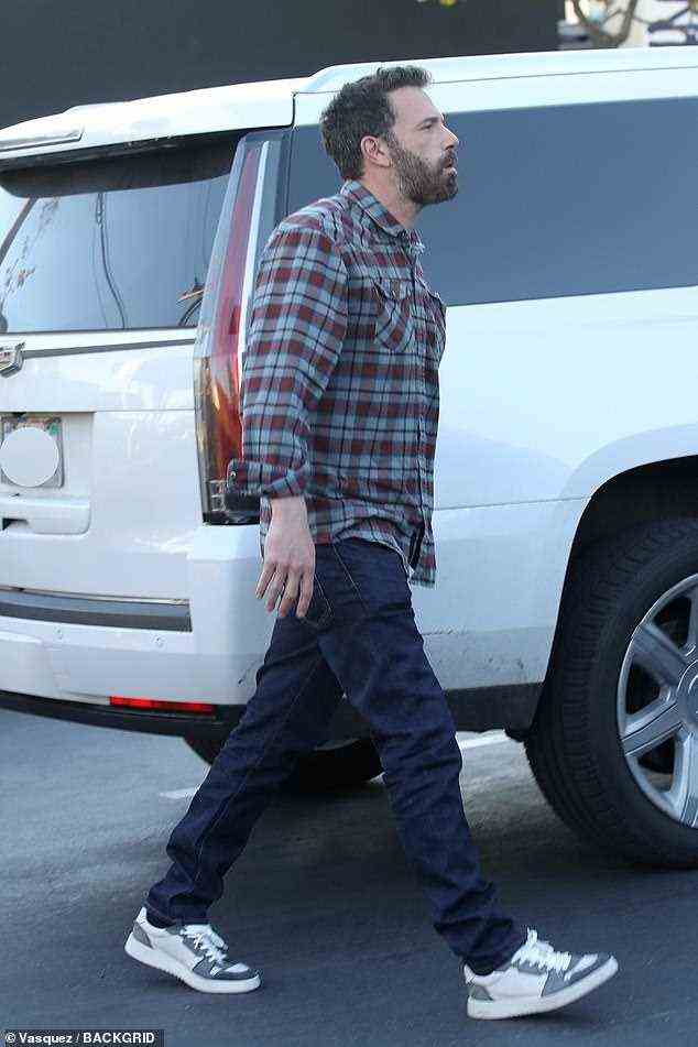 Step-daddy dearest? The Good Will Hunting actor was pictured getting out of his usual white SUV in a flannel shirt and jeans with casual sneakers