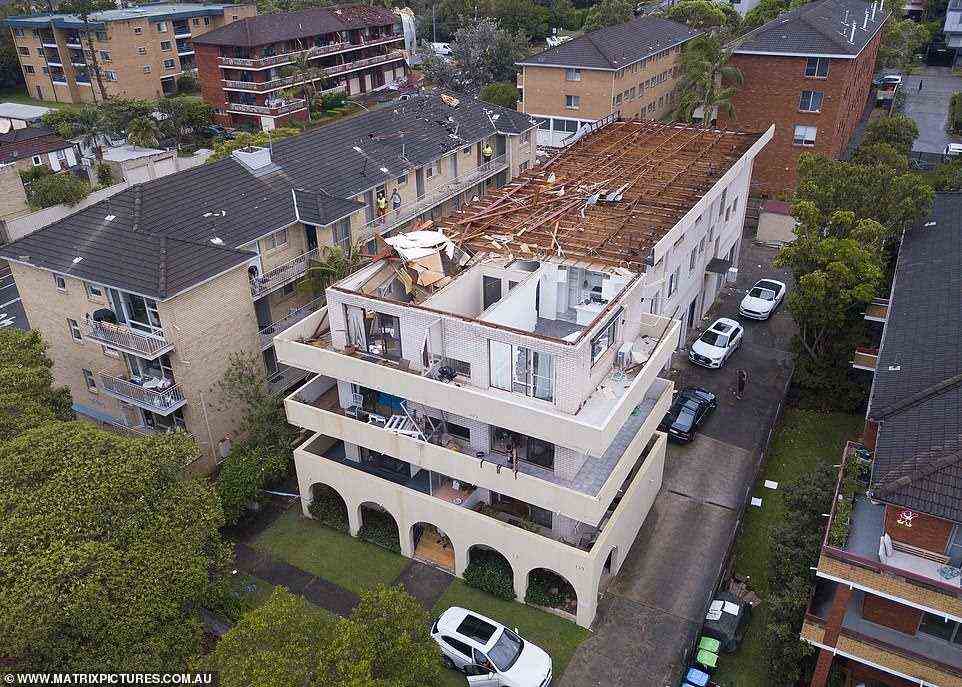 The Dee Why apartment building was ripped open exposing homes in the top floor on Sunday afternoon