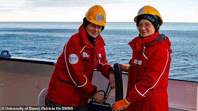 Previous studies, the researchers explained, have typically excluded any particles that could have come from their own research vessel without analysing them further. Pictured: Professor Patricia Holm and Clara Leistenschneider pose of the deck of the RV Polarstern