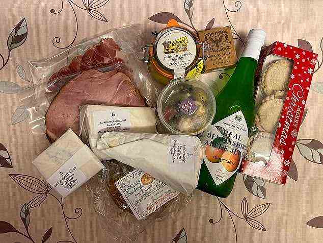 Jessica said: 'While not the perfect box for Christmas dinner, this hamper makes a great addition to any festive day or as a spectacular gift for a loved one. Containing honey roast ham, Vicky's Bread Sourdough Bordelaise Loaf, mince pies, stilton and the ingredients to create Mulled Wine, it went down a treat.'