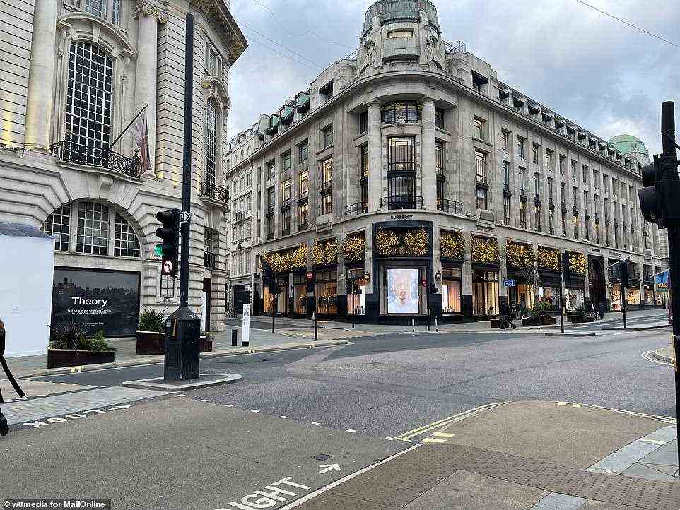 The Burberry store on Regent Street in London is pictured at about 10am today as more and more people work from home