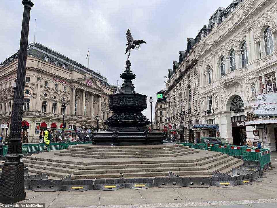 The Shaftesbury Memorial Fountain - better known as 'Eros' - at Piccadilly Circus is pictured at about 11.30am this morning