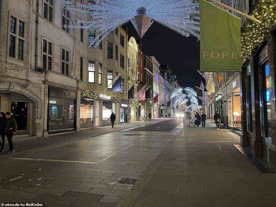 A very quiet Old Bond Street in London's West End last night as people stay at home with just days to go until Christmas