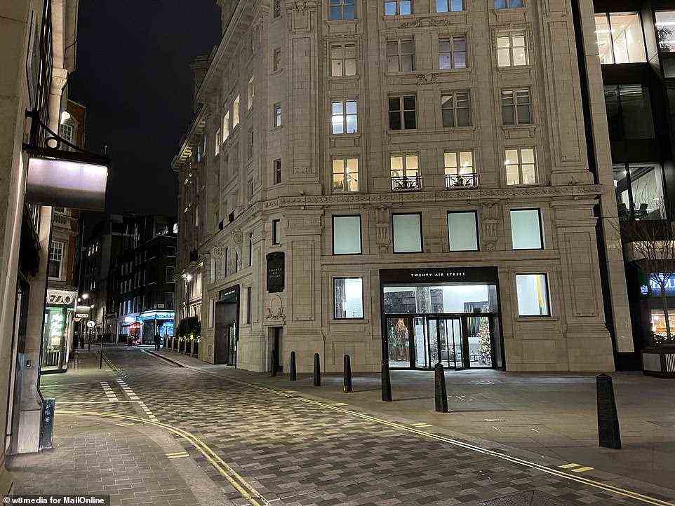 Air Street is among the deserted roads in London's West End yesterday evening as people stay at home