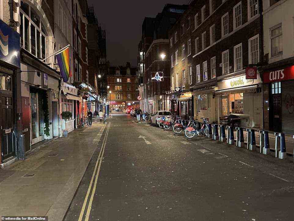 An almost empty Frith Street in London's West End district yesterday evening as people stay at home