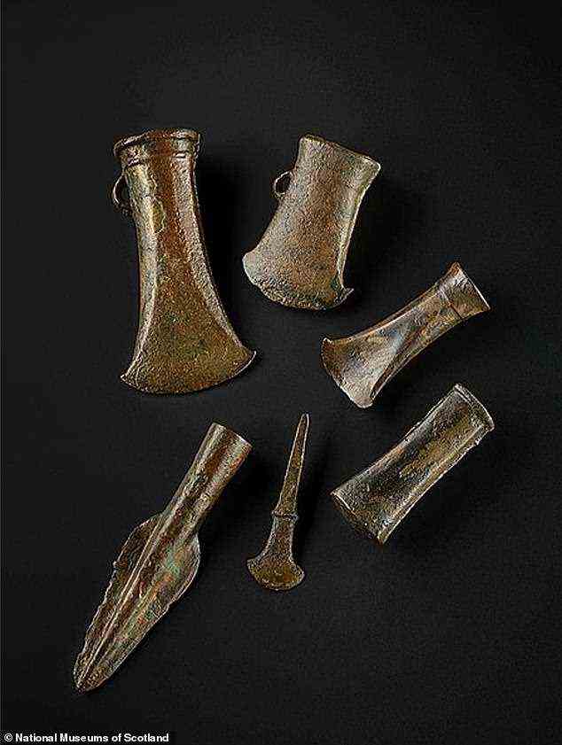During Bronze Age Britain, bronze tools, pots and weapons were brought over from continental Europe. Pictured are bronze age tools from the National Museums of Scotland