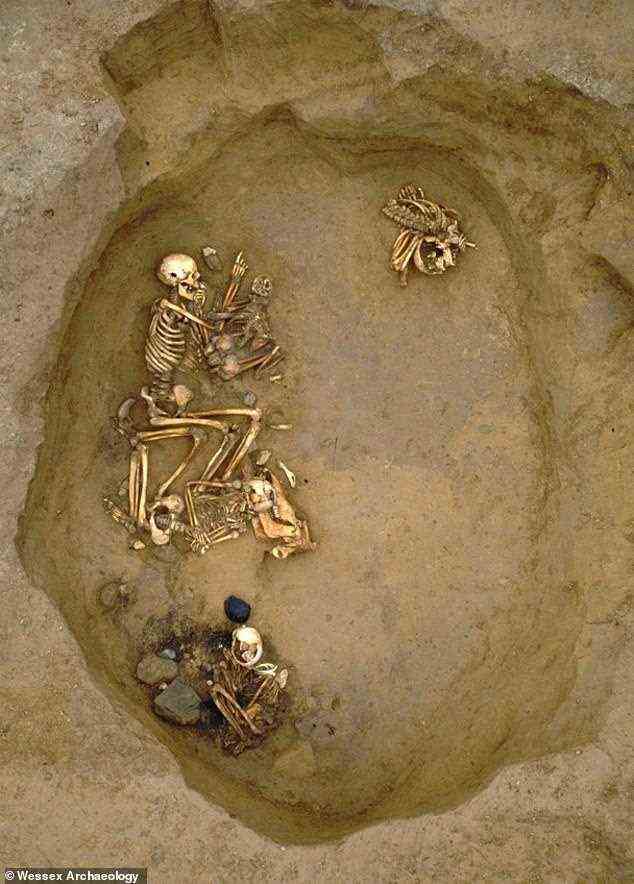 This image shows an overview of the Cliffs End Farm burial pit showing both the already pictured adult male and adult female along with a further two; a teenage girl and female child. DNA analysis has been conducted on all four as part of the present study