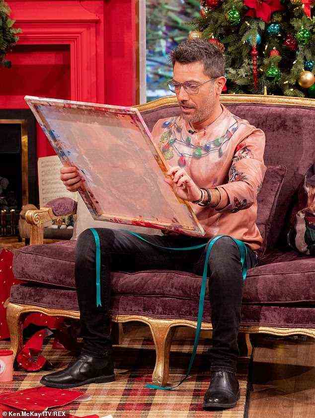 Reaction: The team then sit down to open gifts from one another, with one gift in particular leaving Gino speechless for a moment when he realises his painting was made using the manhood of a former This Morning guest!