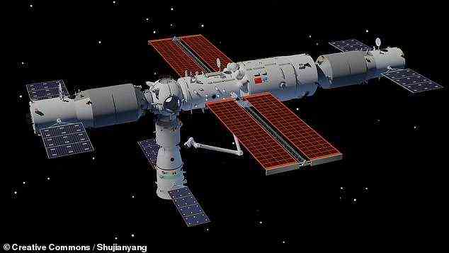 Pictured: an artist's impression of China's Tiangong Space Station. This Christmas it will be occupied by three astronauts — Ye Guangfu, Wang Yaping and Zhai Zhigang