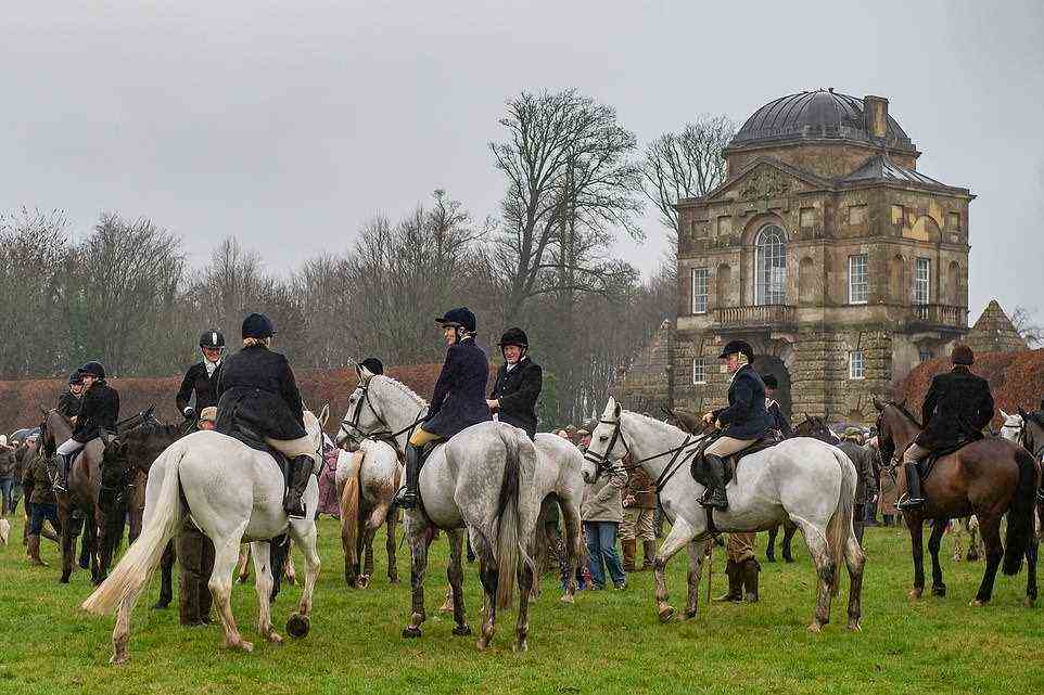 The Duke of Beaufort's Hunt Boxing Day meet at Worcester Lodge, Didmarton, Gloucestershire, on a drizzly Monday morning