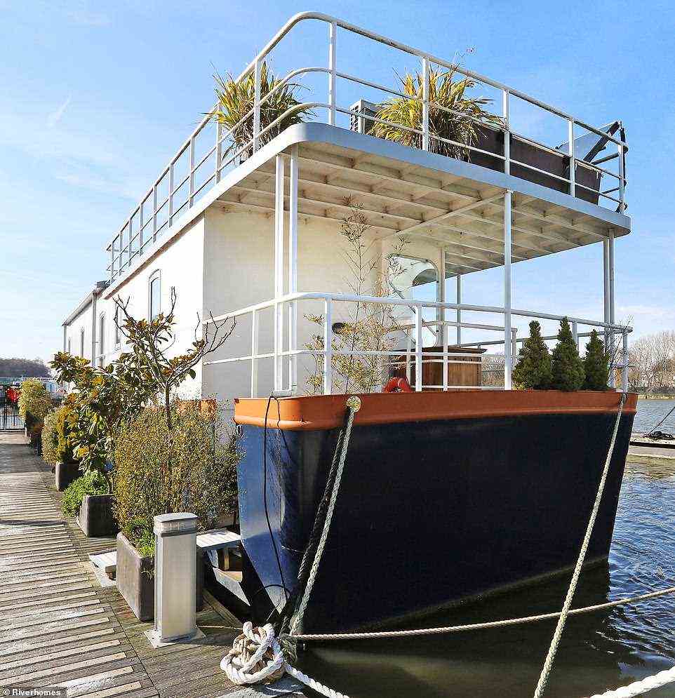 Houseboat 'Penelope' claims to be one of the most stylish and attractive boats on the Thames (pictured) - but will cost potential buyers a staggering £1.75million