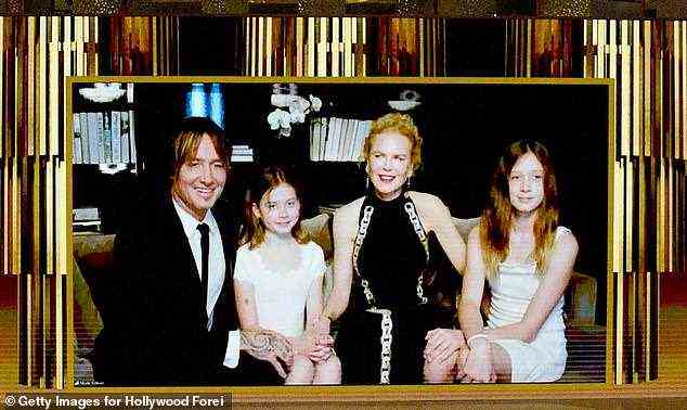 Familienangelegenheit: Das Paar, das 2006 geheiratet hat, ist Eltern von zwei Töchtern, Sunday Rose (13) und Faith Margaret (10). Im Bild: die Familie bei den 78. jährlichen Golden Globe Awards