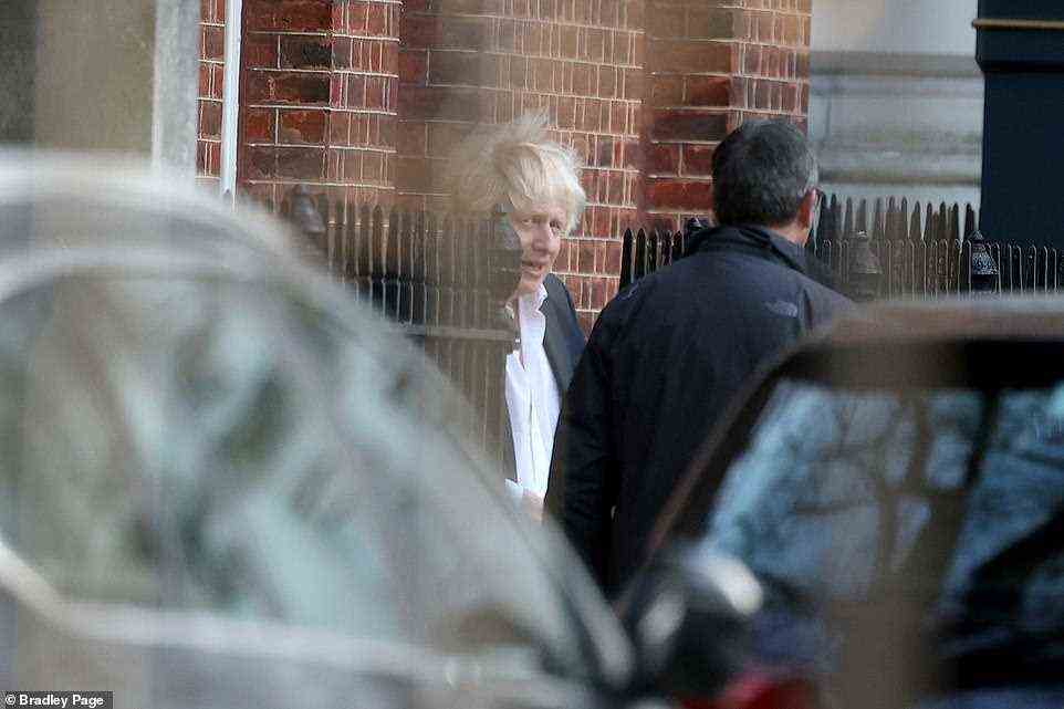 A tired looking Boris Johnson leaves Downing Street to return to hospital to be with Carrie and their new daughter