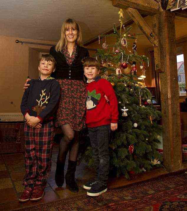 When I had a family of my own, I was determined to avoid the disastrous Christmases of my own childhood. There¿d be no tension, no stress or dysfunction. Pictured, Flora Watkins with her sons Jago and Gussie at Christmas