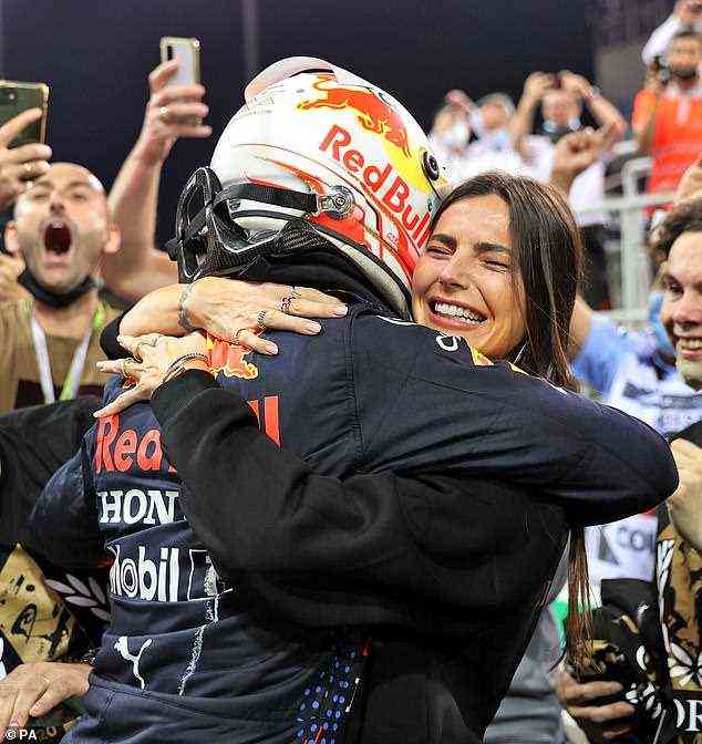 Champion: Max Verstappen, 24, und seine Freundin Kelly Piquet, 33, teilten eine emotionale Umarmung, nachdem er am Sonntag in Abu Dhabi seine erste F1-Weltmeisterschaft gewonnen hatte