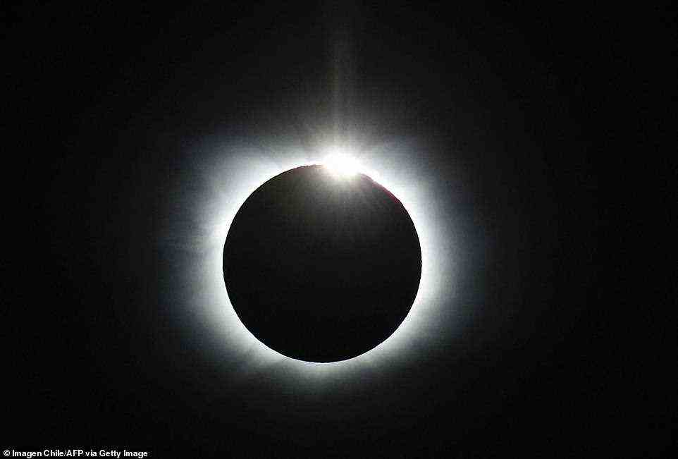 This year's only total solar eclipse — which took place over Antarctica on Saturday morning — has been revealed in stunning photos taken by a few of the lucky viewers who witnessed it from the southernmost continent. Pictured: the total solar eclipse as seen from the Union Glacier in Antarctica