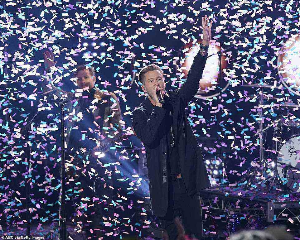 Rock on: Prior to Carey's entrance, OneRepublic delivered the first performance of the night with a rendition of their song Counting Stars