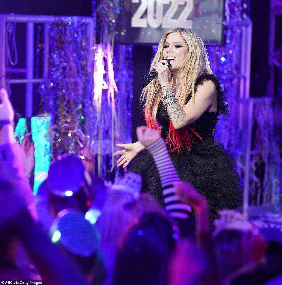 Fierce: Avril Lavigne and Travis Barker also saved their new material for later in the evening. The rockers performed their new single Bite Me, which Lavigne wrote with several songwriters and Barker co-produced and played drums on