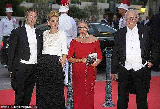 Former royal family: Clotilde Courau (centre left) and Emanuele Filiberto (left) arrive with Prince Vittorio Emanuele of Savoy and Princess Marina of Savoy (centre right) for a dinner at Opera terraces after the wedding ceremony of Princess Charlene of Monaco and Prince Albert II of Monaco on July 2, 2011