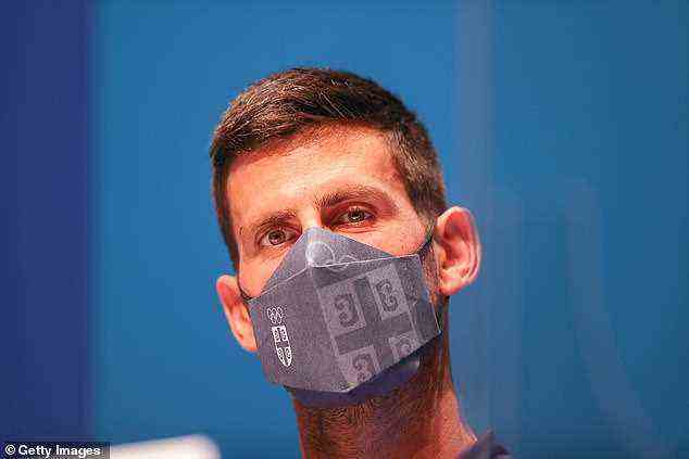 Djokovic (pictured) is yet to reveal whether he is jabbed but has been a vocal critic against mandatory vaccinations