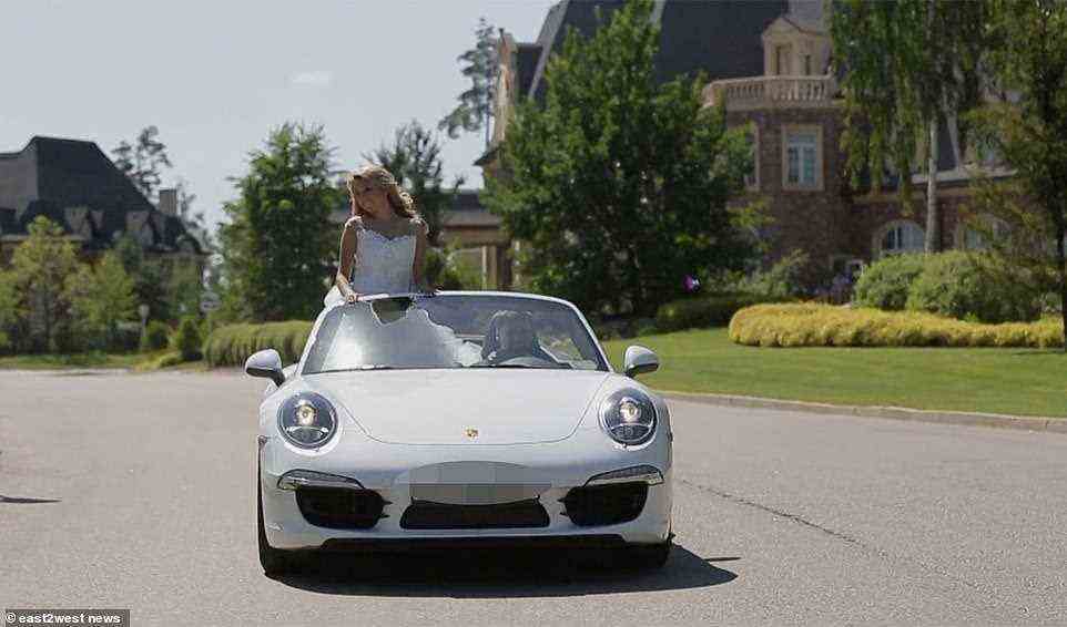 The wedding video shows the couple driving in a white Porsche 911 Carrera 4S which starts at around $124,400