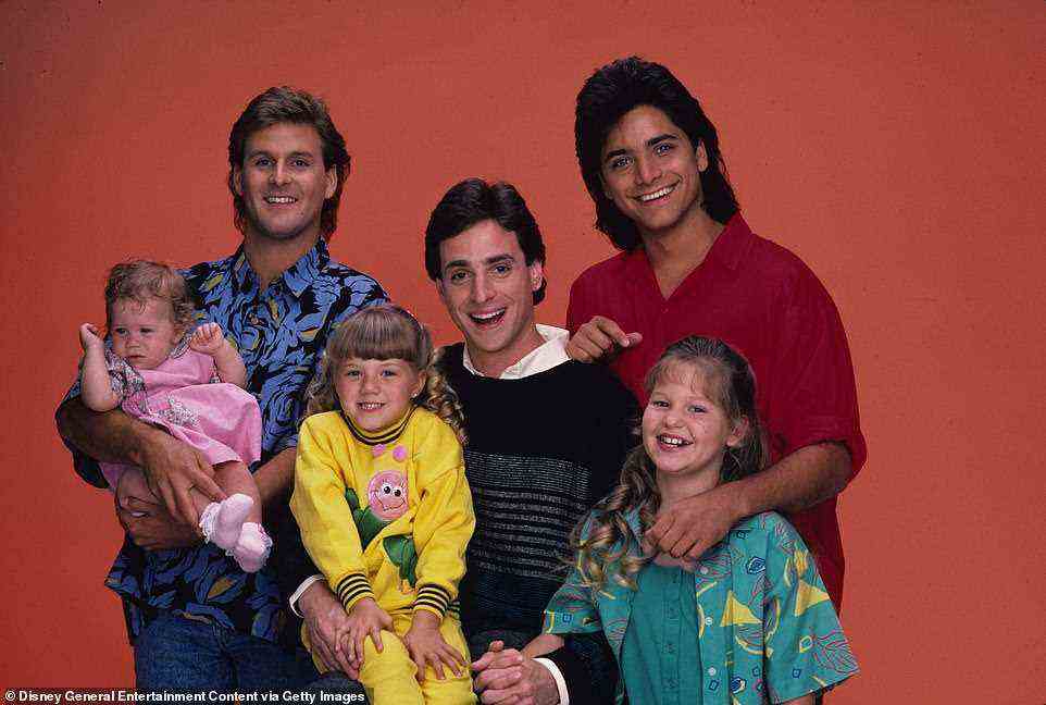 Mysterious death: Few details are currently available about the circumstances leading up to Saget's death, though sources say that he was pronounced dead in his hotel room; seen on Full House in 1987 with (L–R) Mary-Kate/Ashley Olsen, Dave Coulier, Jodie Sweetin, John Stamos and Candace Cameron Bure