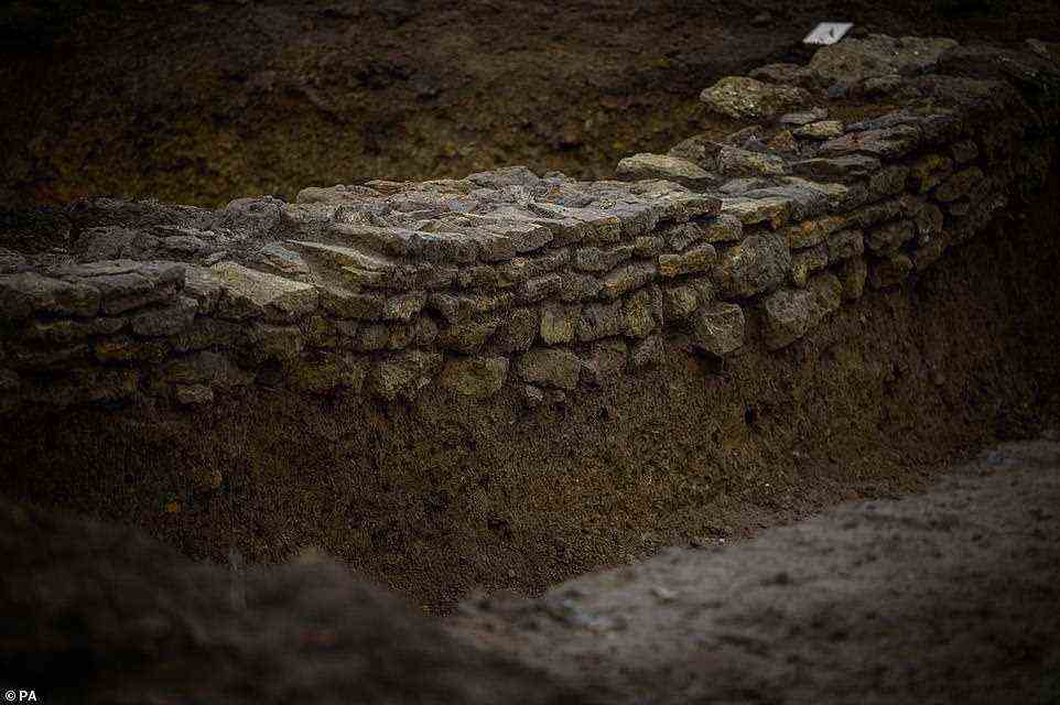 Pictured is remains of a Roman wall at the Blackgrounds site. Evidence suggests the settlement was established in about 400 BC - during the Iron Age