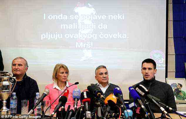 Serbian tennis player Novak Djokovic's (pictured left to right) uncle Goran, mother Dijana, father Srdjan and brother Djordje hold a press conference in Belgrade on Monday night - saying the tennis champion had his 'human rights taken away'