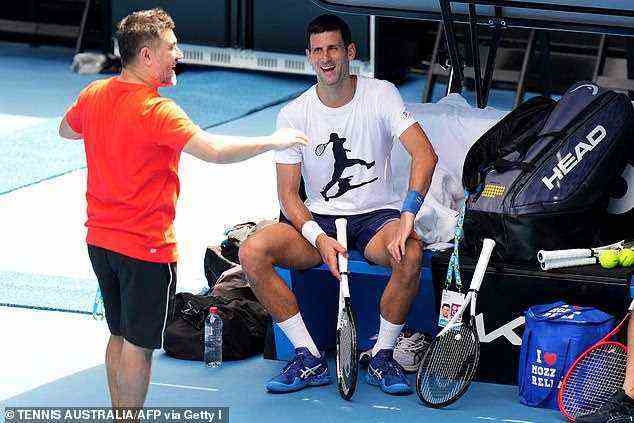 Novak Djokovic was all smiles on Tuesday at a practice session in Melbourne. He has hit out at 'misinformation' over claims he tested positive to Covid and then attended an event with children