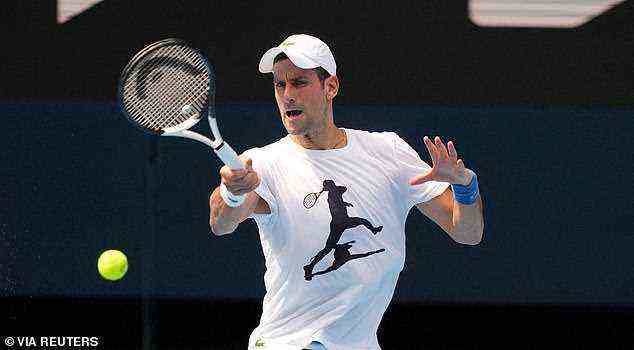 Djokovic pictured at his first full practice session on Rod Laver Arena on Tuesday after he spent five days holed up in immigration detention