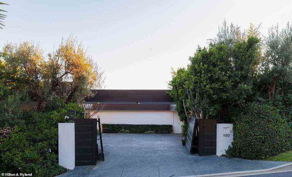 Away from the hustle and bustle: The home is tucked away and private thanks to the entrance gate