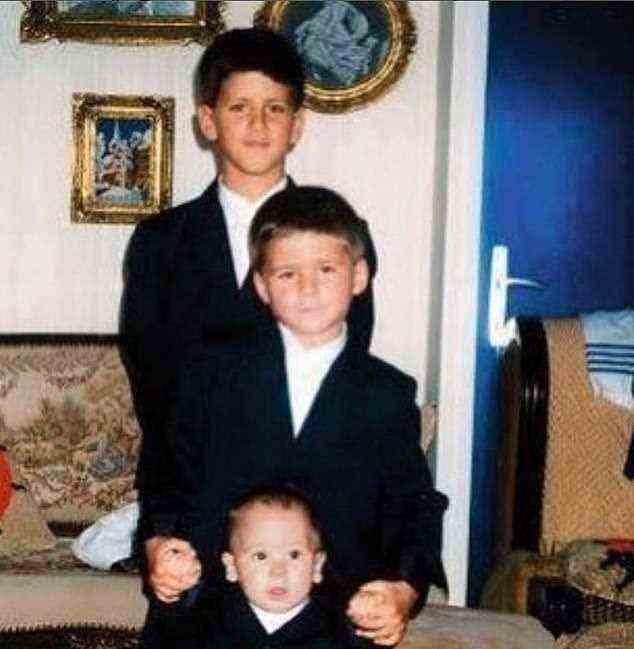 Trio of talent: the three brothers growing up in Belgrade, Serbia - Novak, the oldest is top, with brother Marko and youngest sibling Djordje at the bottom of the photo
