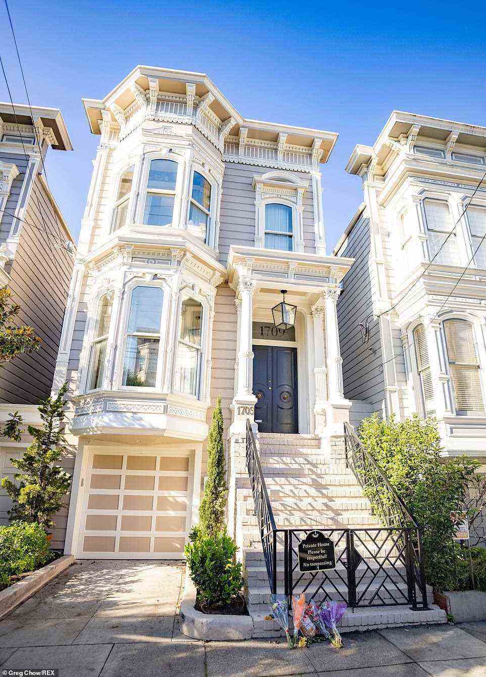 Flowers are seen left outside the San Francisco home used in exterior shots of Full House in honor of Bob Saget who died suddenly on Sunday, aged 65
