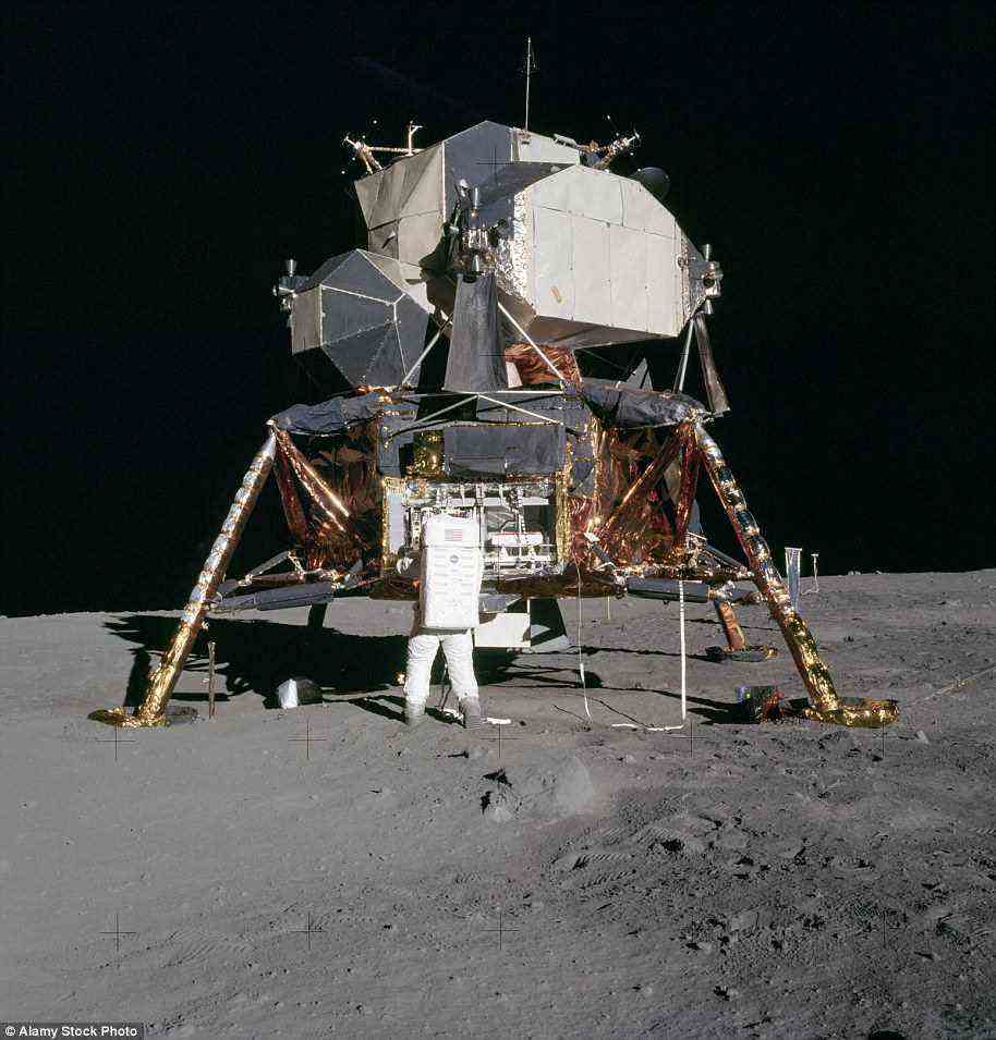 Astronaut Edwin 'Buzz' Aldrin unpacking experiments from the Lunar Module on the moon during the Apollo 11 mission. Photographed by Neil Armstrong, 20 July 1969