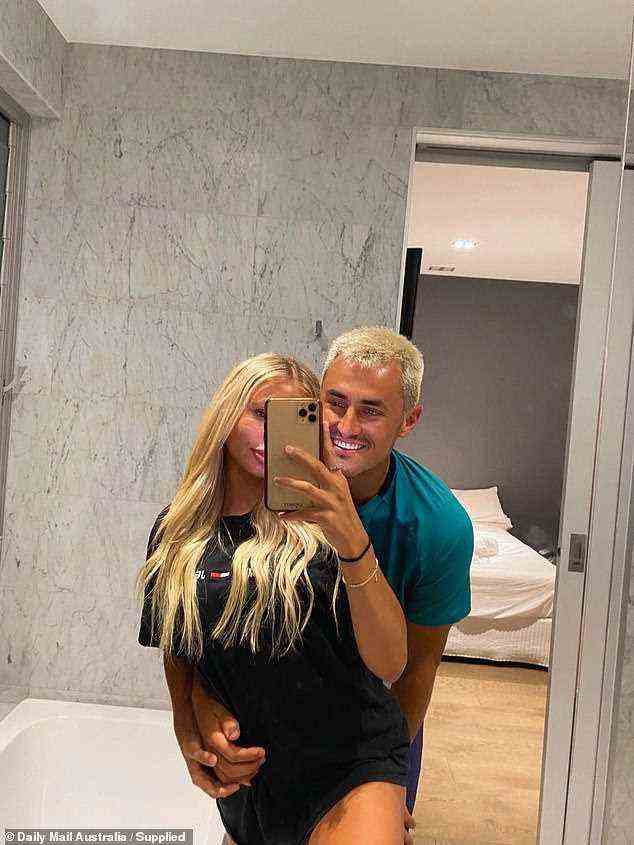 Sweet: Tomic went public with Hannah earlier this month, posting several photos of the couple posing arm in arm with matching peroxide hair