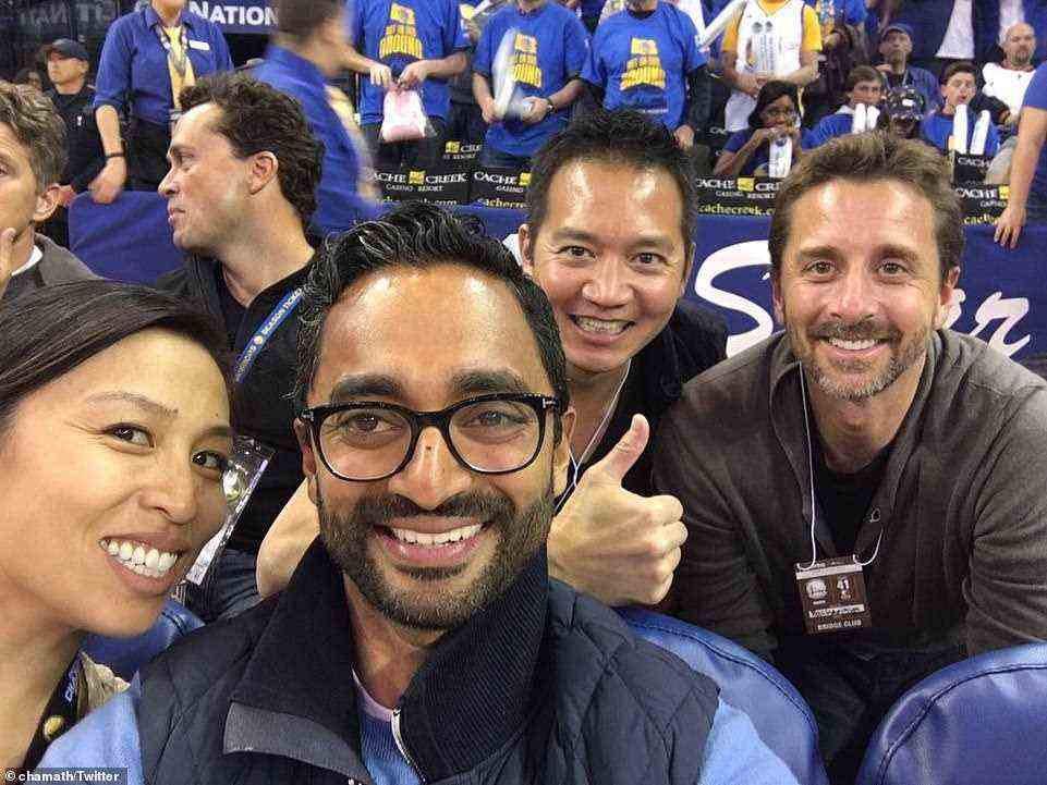 Chamath Palihapitiya (center) attends a Golden State Warriors game with wife Brigette Lau and friends in April 2016. He is said to own around 10 percent of the team