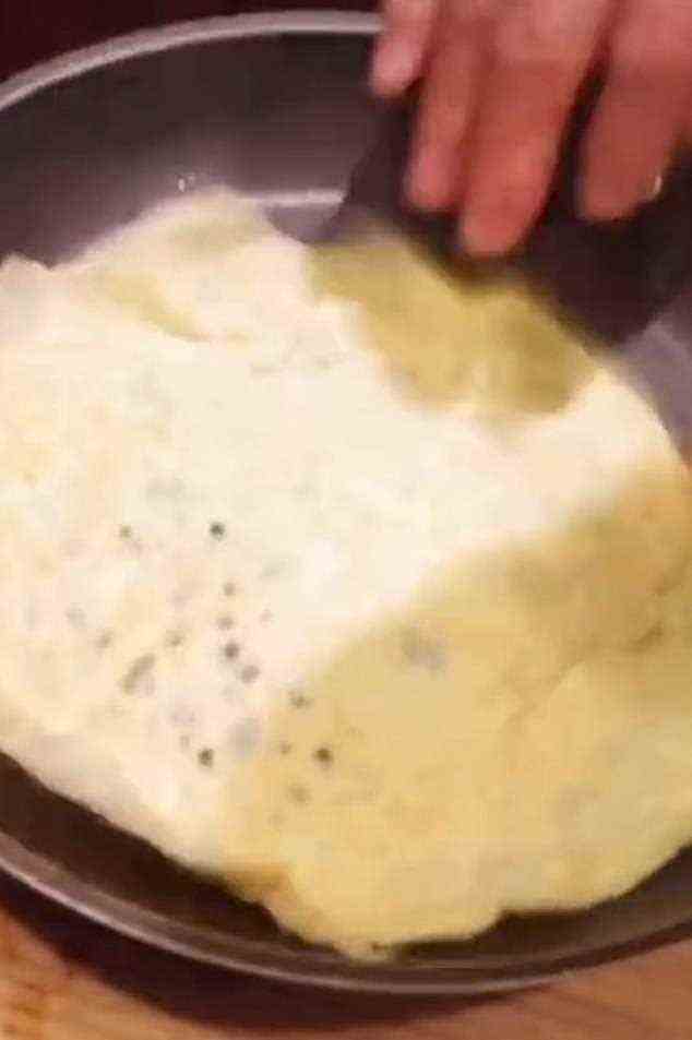 After that, he made a crepe by mixing eggs, corn starch, olive oil, and salt, and frying it on the stove
