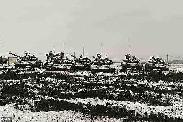 Russian tanks are seen massing near the Ukrainian border earlier this month