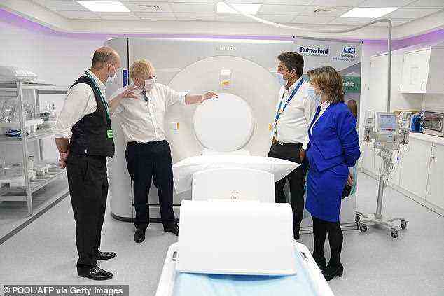 Prime minister Boris Johnson pictured here in a visit to Rutherford Diagnostic Centre in Taunton said clearing the Covid care backlog was Britain's number one issue