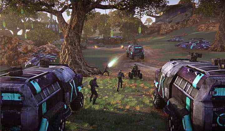 A platoon of soldiers advance through a wooded area in Planetside 2.