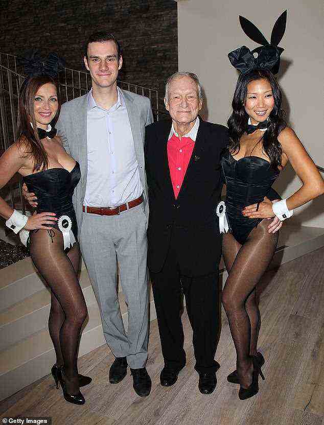 Cooper (pictured with his father in 2012) said the Playboy founder was 'generous in nature' and was 'not a liar'