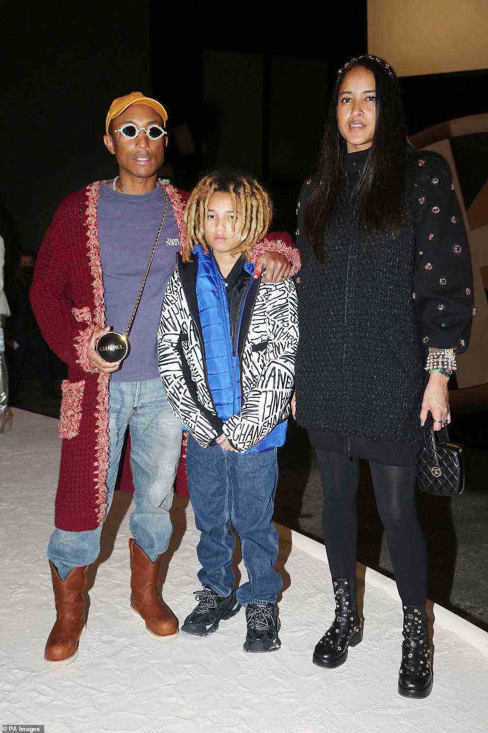 Fashionable family: Pharrell arrived with his son Rocket Ayer Williams and his wife Helen Lasichanh
