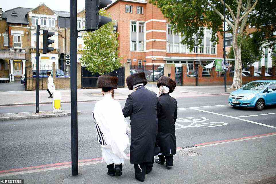 Some 87 incidents were recorded in May, four times higher than any other month in the past three years, according to Met Police statistics. Pictured: Library image of Jewish people walking around the Stamford Hill - which is home to one of the largest Hasidic Jewish communities in Europe