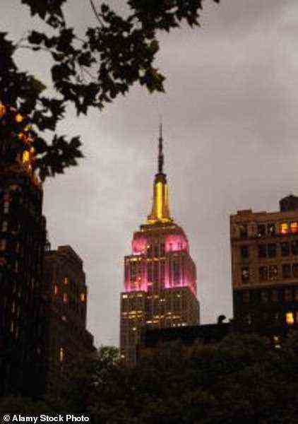 The Empire State Building in New York in gold and purple lights for the Golden Jubilee of Queen Elizabeth II